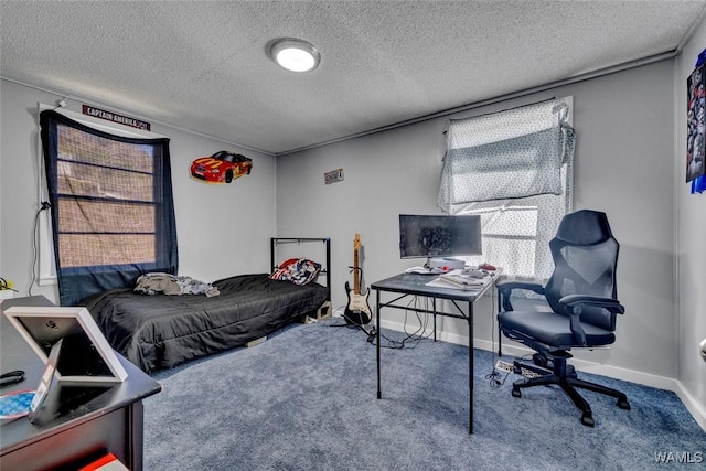 bedroom with a textured ceiling, baseboards, and carpet flooring