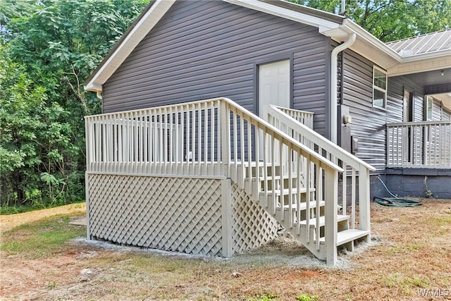 view of side of home featuring a deck