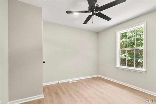 unfurnished room featuring ceiling fan and light hardwood / wood-style floors