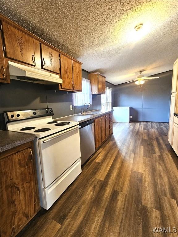 kitchen featuring a textured ceiling, ceiling fan, sink, dishwasher, and white range with electric cooktop