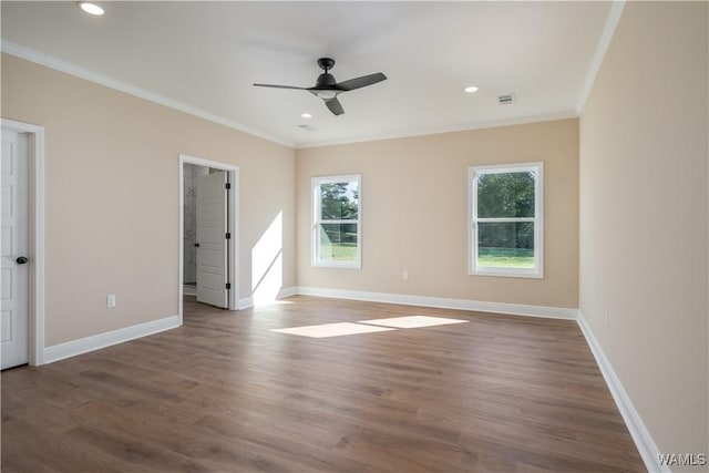 unfurnished bedroom featuring ceiling fan, ornamental molding, and dark hardwood / wood-style floors