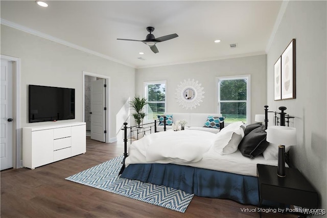 bedroom with crown molding, dark hardwood / wood-style floors, and ceiling fan