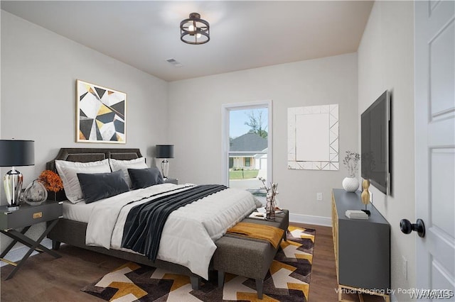 bedroom featuring dark hardwood / wood-style floors