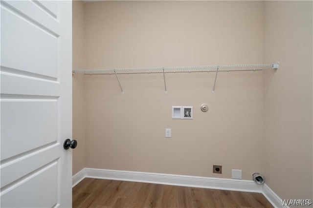 laundry room featuring baseboards, washer hookup, wood finished floors, laundry area, and electric dryer hookup