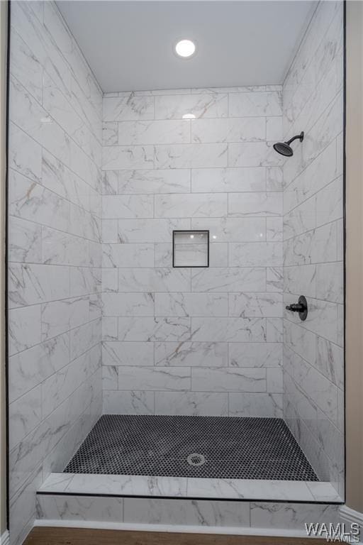 bathroom with a stall shower