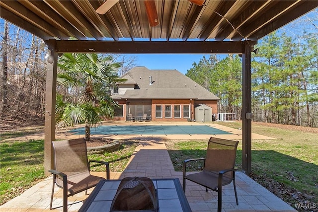 view of patio with a fenced in pool