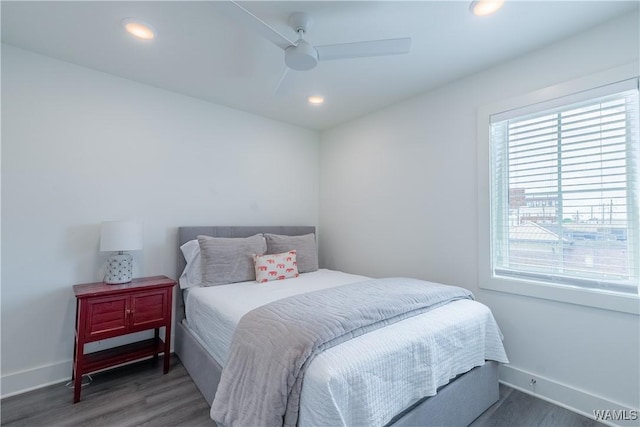 500 Grace St Unit 304, Tuscaloosa, AL 35401 - bedroom with multiple windows, wood finished floors, ceiling fan, and recessed lighting
