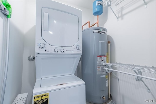 500 Grace St Unit 304, Tuscaloosa, AL 35401 - laundry room featuring water heater and stacked washer / dryer