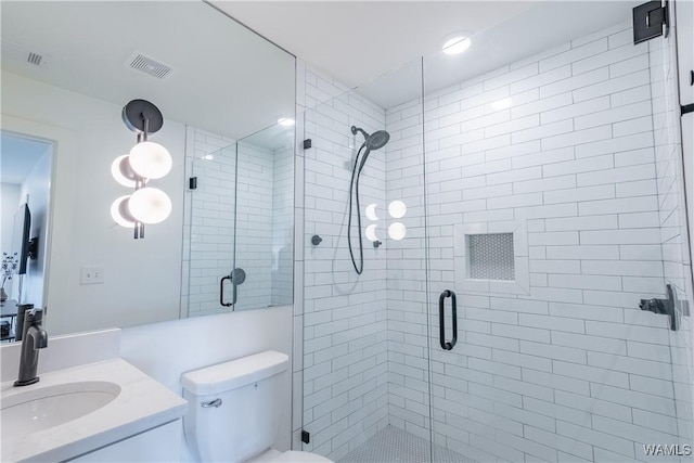 500 Grace St Unit 304, Tuscaloosa, AL 35401 - bathroom with vanity, a stall shower, and recessed lighting