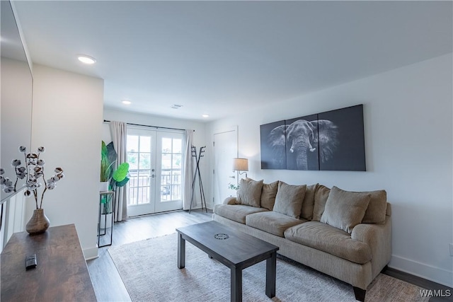 500 Grace St Unit 304, Tuscaloosa, AL 35401 - living area featuring french doors, wood finished floors, and recessed lighting