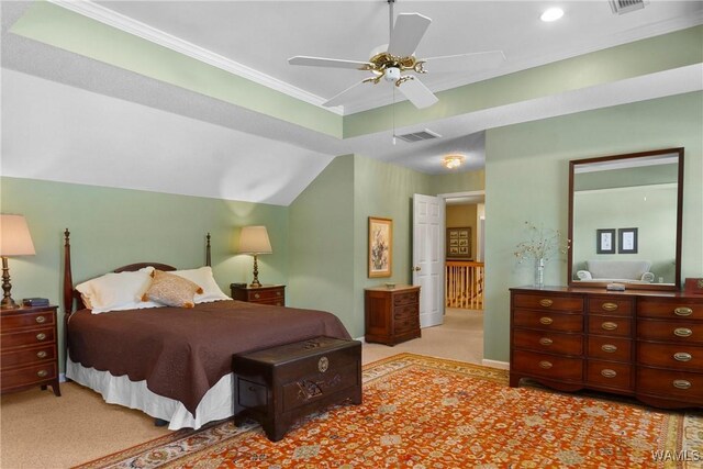 bedroom featuring lofted ceiling, light colored carpet, ceiling fan, and crown molding