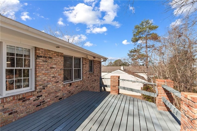 wooden deck featuring fence