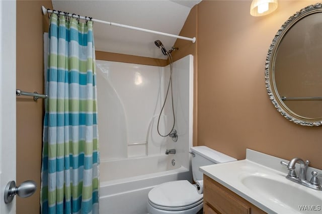 full bathroom featuring shower / tub combo, vanity, and toilet