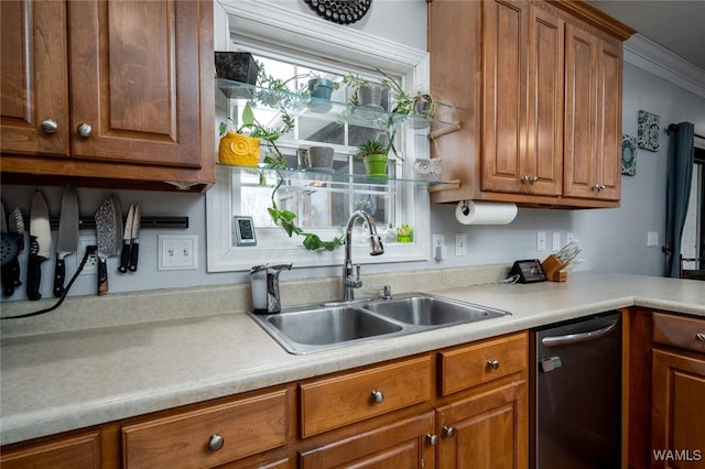 kitchen with dishwasher, ornamental molding, and sink