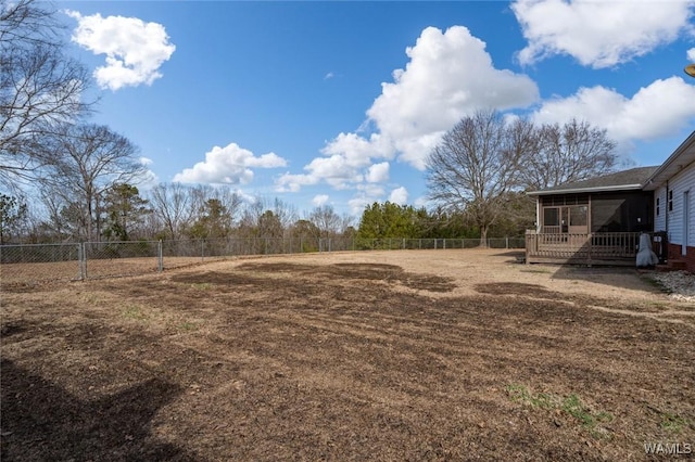 view of yard with a sunroom