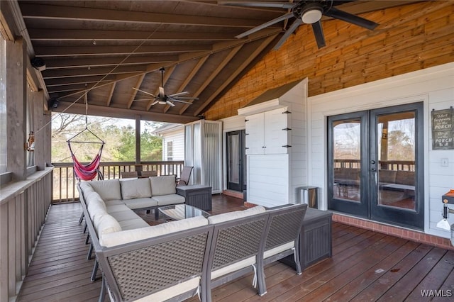 wooden terrace featuring an outdoor hangout area, ceiling fan, and french doors