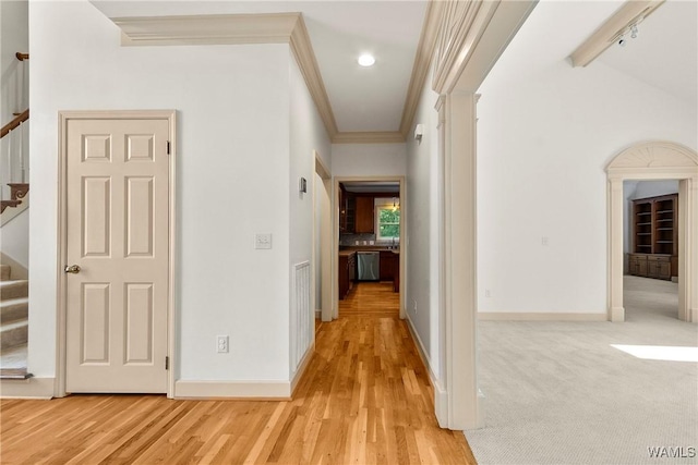 6803 Emerald Ln, Tuscaloosa, AL 35406 - hall featuring stairway, light wood finished floors, baseboards, recessed lighting, and crown molding