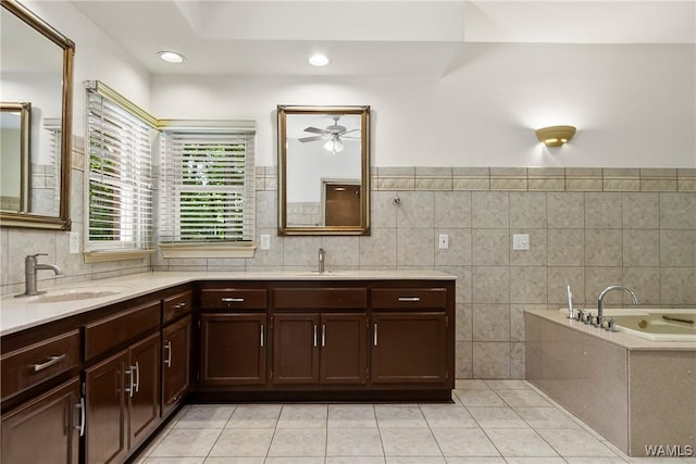6803 Emerald Ln, Tuscaloosa, AL 35406 - full bathroom with double vanity, tile patterned flooring, a ceiling fan, a garden tub, and recessed lighting