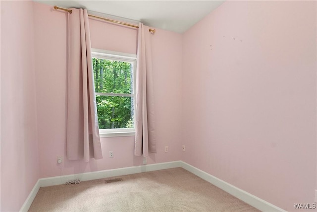 6803 Emerald Ln, Tuscaloosa, AL 35406 - carpeted spare room featuring baseboards