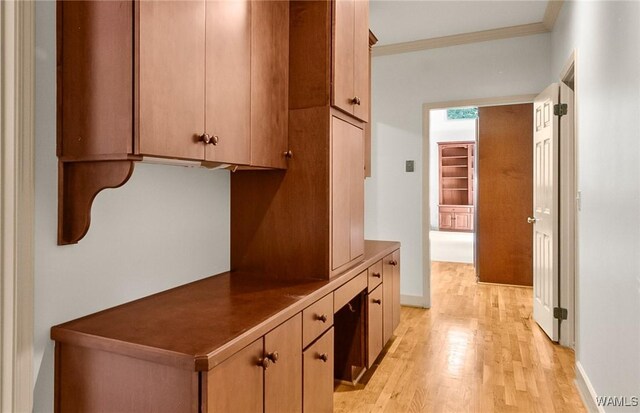 6803 Emerald Ln, Tuscaloosa, AL 35406 - corridor with light wood-type flooring, crown molding, and baseboards