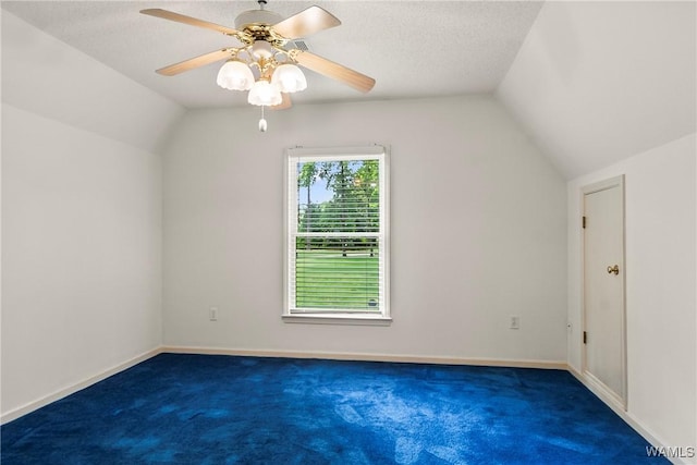 6803 Emerald Ln, Tuscaloosa, AL 35406 - bonus room featuring lofted ceiling, carpet flooring, a ceiling fan, and baseboards