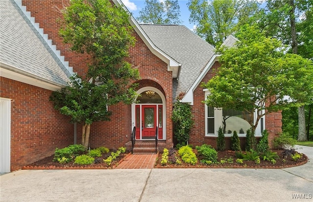 6803 Emerald Ln, Tuscaloosa, AL 35406 - property entrance featuring brick siding and roof with shingles