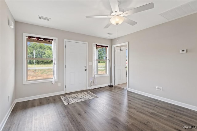 entrance foyer featuring ceiling fan and dark hardwood / wood-style flooring