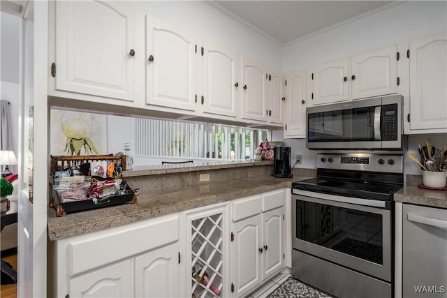 kitchen featuring wine cooler, white cabinetry, stainless steel appliances, and crown molding