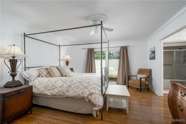 bedroom featuring ceiling fan, wood finished floors, and crown molding