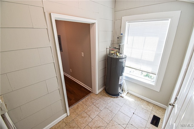 entryway featuring electric water heater