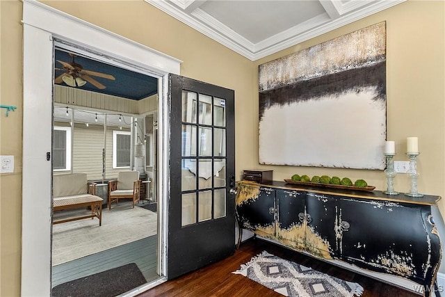 doorway to outside featuring ornamental molding, a ceiling fan, and wood finished floors