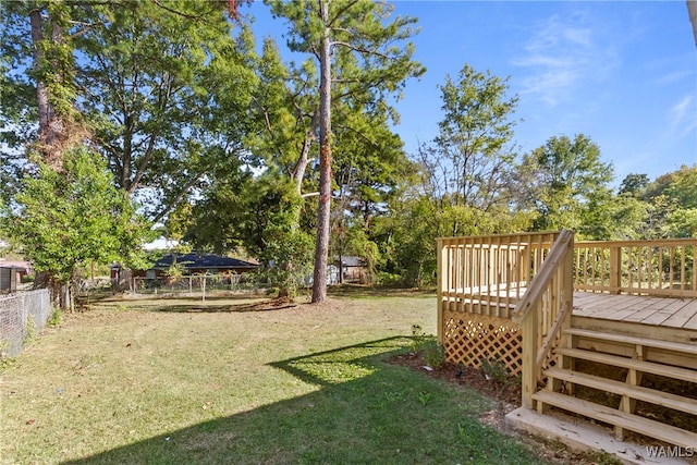 view of yard with a deck