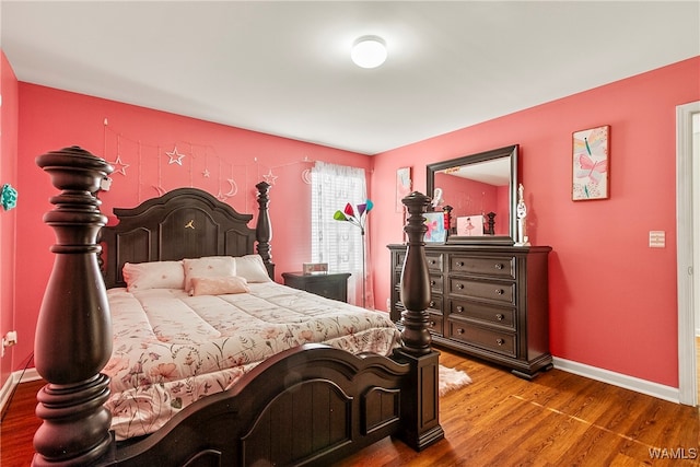 bedroom featuring hardwood / wood-style floors