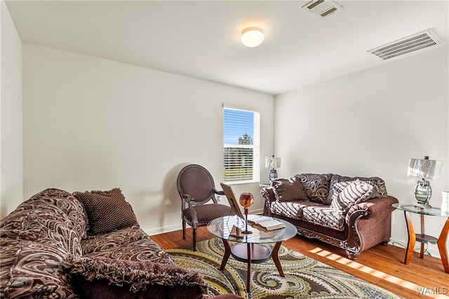 living room with hardwood / wood-style floors