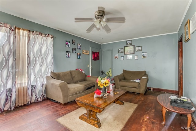 living room featuring ceiling fan, dark wood-type flooring, and ornamental molding