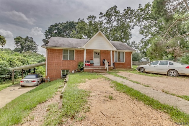 view of front of house with a carport