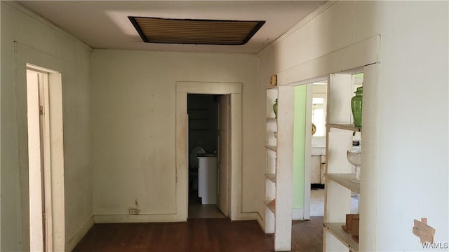 interior space with dark wood-style floors and crown molding