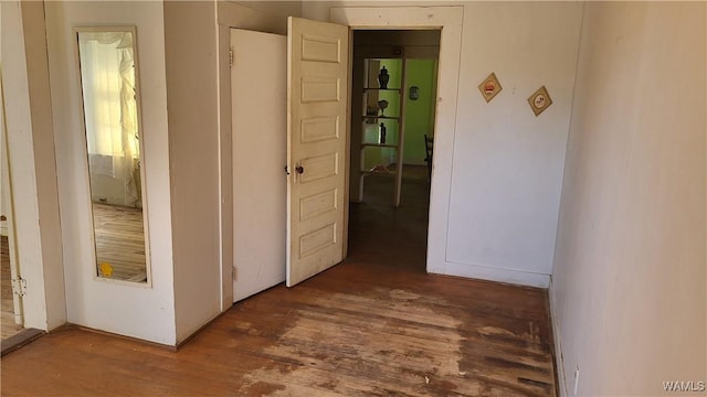 corridor with wood finished floors