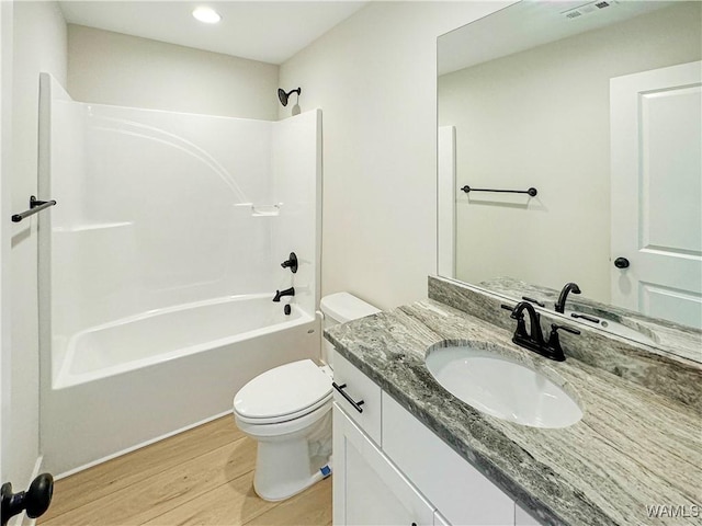 8 Northside Rd, Berry, AL 35546 - full bathroom with toilet, vanity, wood finished floors, shower / tub combination, and recessed lighting