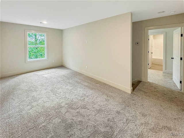 8 Northside Rd, Berry, AL 35546 - spare room featuring baseboards and carpet
