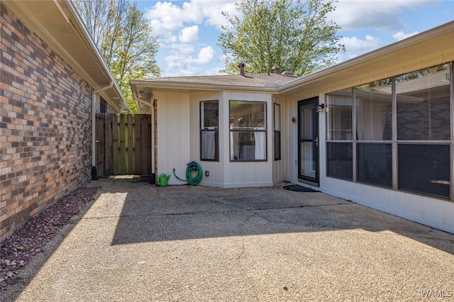 doorway to property featuring a patio area