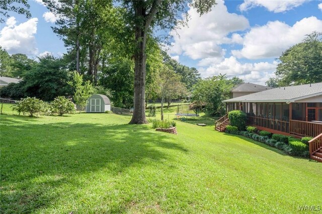 1428 Plymouth Ln, Tuscaloosa, AL 35406 - view of yard featuring a sunroom, a storage shed, and stairs