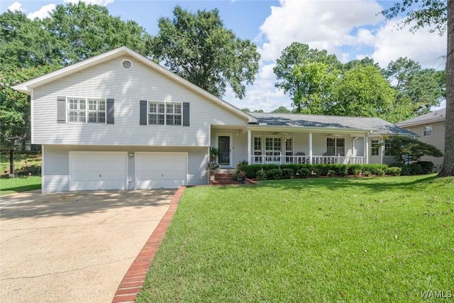 1428 Plymouth Ln, Tuscaloosa, AL 35406 - tri-level home with a porch, a front yard, concrete driveway, and a garage