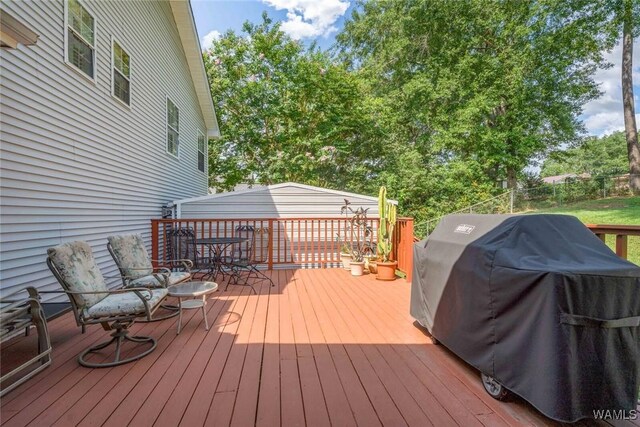 1428 Plymouth Ln, Tuscaloosa, AL 35406 - wooden terrace featuring area for grilling and outdoor dining space