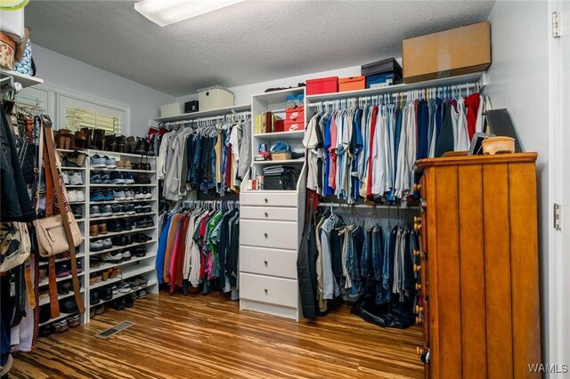 1428 Plymouth Ln, Tuscaloosa, AL 35406 - walk in closet featuring wood finished floors