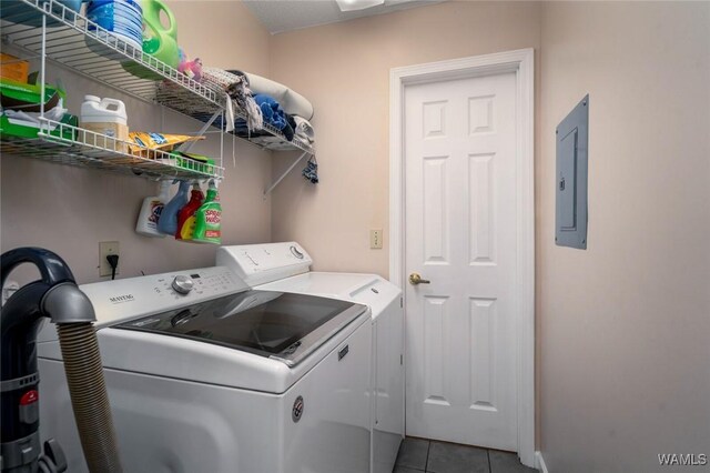 1428 Plymouth Ln, Tuscaloosa, AL 35406 - washroom featuring washer and clothes dryer, electric panel, and tile patterned flooring