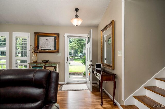 1428 Plymouth Ln, Tuscaloosa, AL 35406 - entryway with wood finished floors and stairs