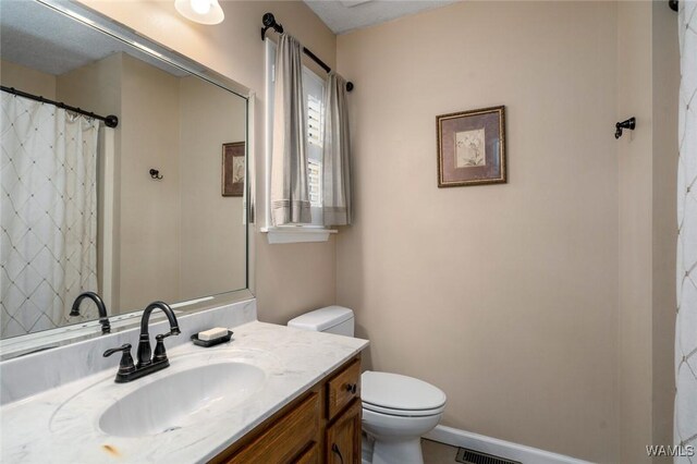 1428 Plymouth Ln, Tuscaloosa, AL 35406 - full bathroom with toilet and vanity