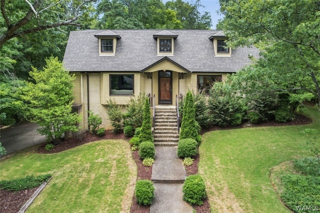 view of front of home with a front yard