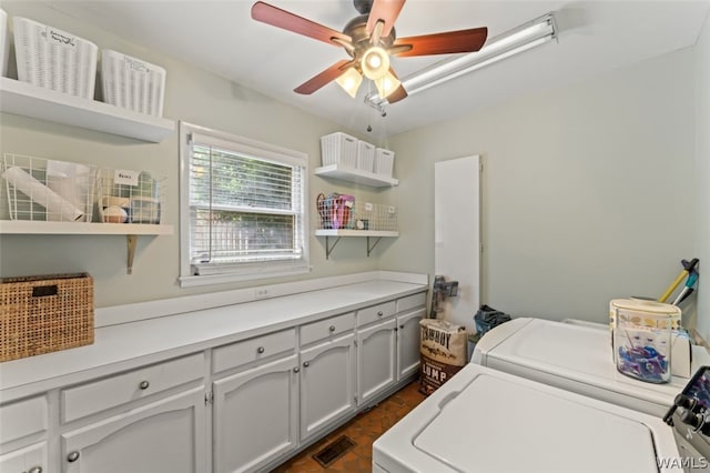 clothes washing area with ceiling fan, cabinets, and independent washer and dryer